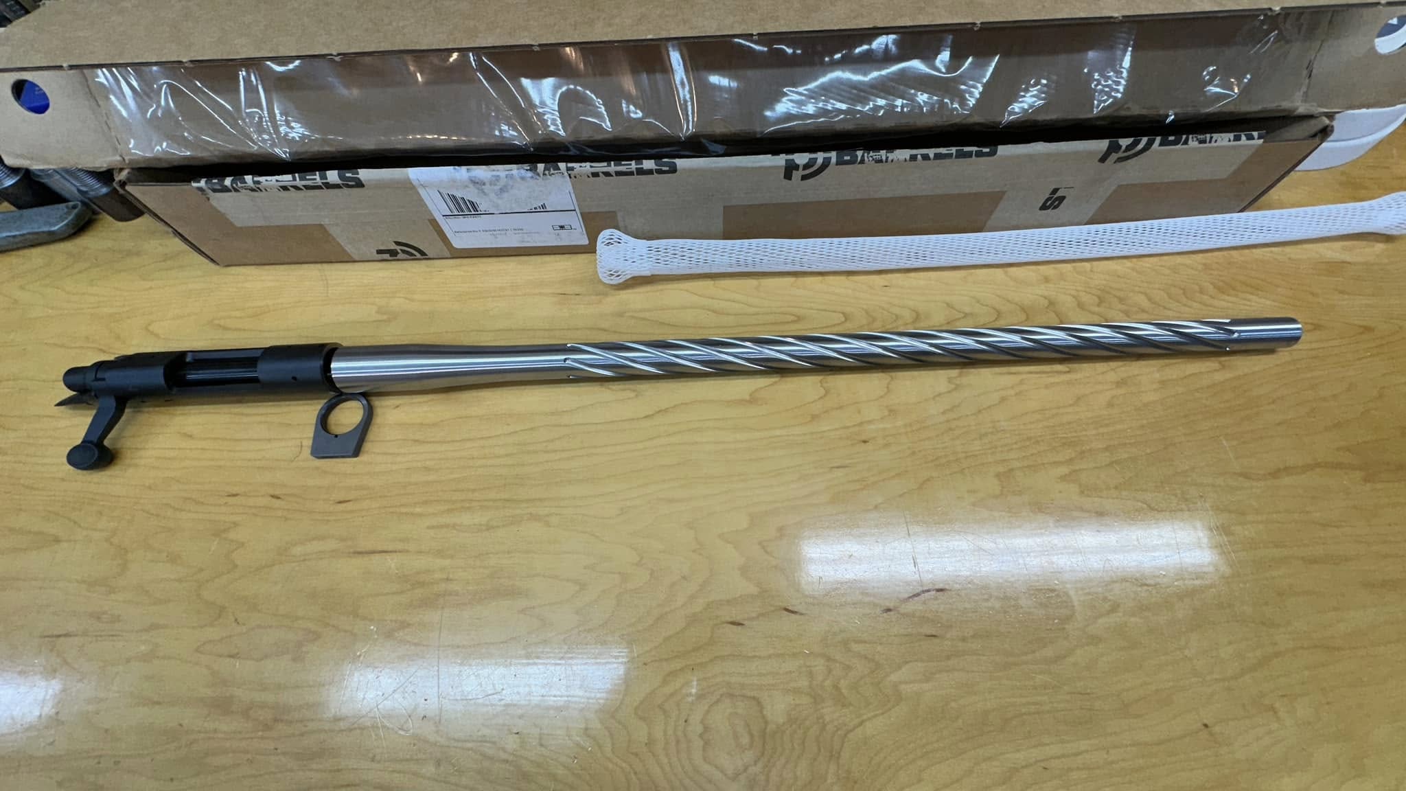 22 Creedmoor build components laid out on workbench